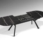 Mesa de comedor ANTEA superficie melamínica de alta resistencia acabado mármol negro brillo y patas en metal negro Schuller