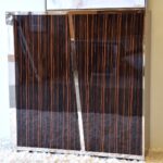 Aparador EBANO alto brillo y acero con 2 puertas