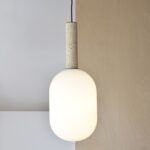 Lámpara de techo FORMAS colgante cristal oval y mármol travertino Vp Interiorismo