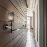 Aplique de pared NORMA negro y dorado con tulipa cristal smoke