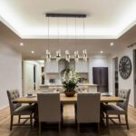 Lámpara en línea ILIADA de 5 luces colgantes con detalle en oro brillo con 35W Led