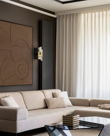 Aplique de pared ILIADA de base negra con detalle en oro brillo con 7W Led