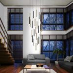 Lámpara VARAS de base redonda con 25 luces en negro y oro de 125W Led Schuller